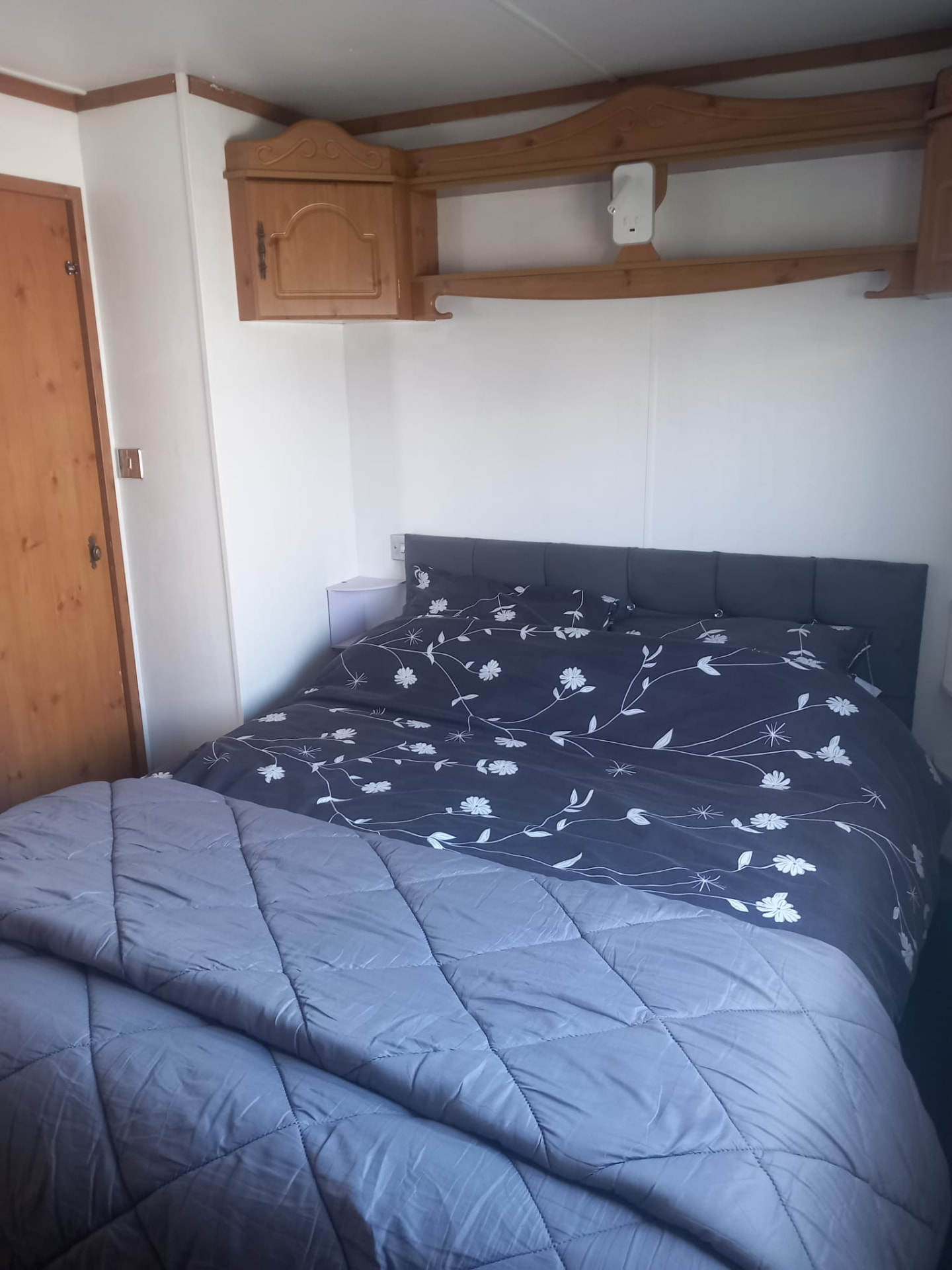 Double bedroom inside holiday caravan C40